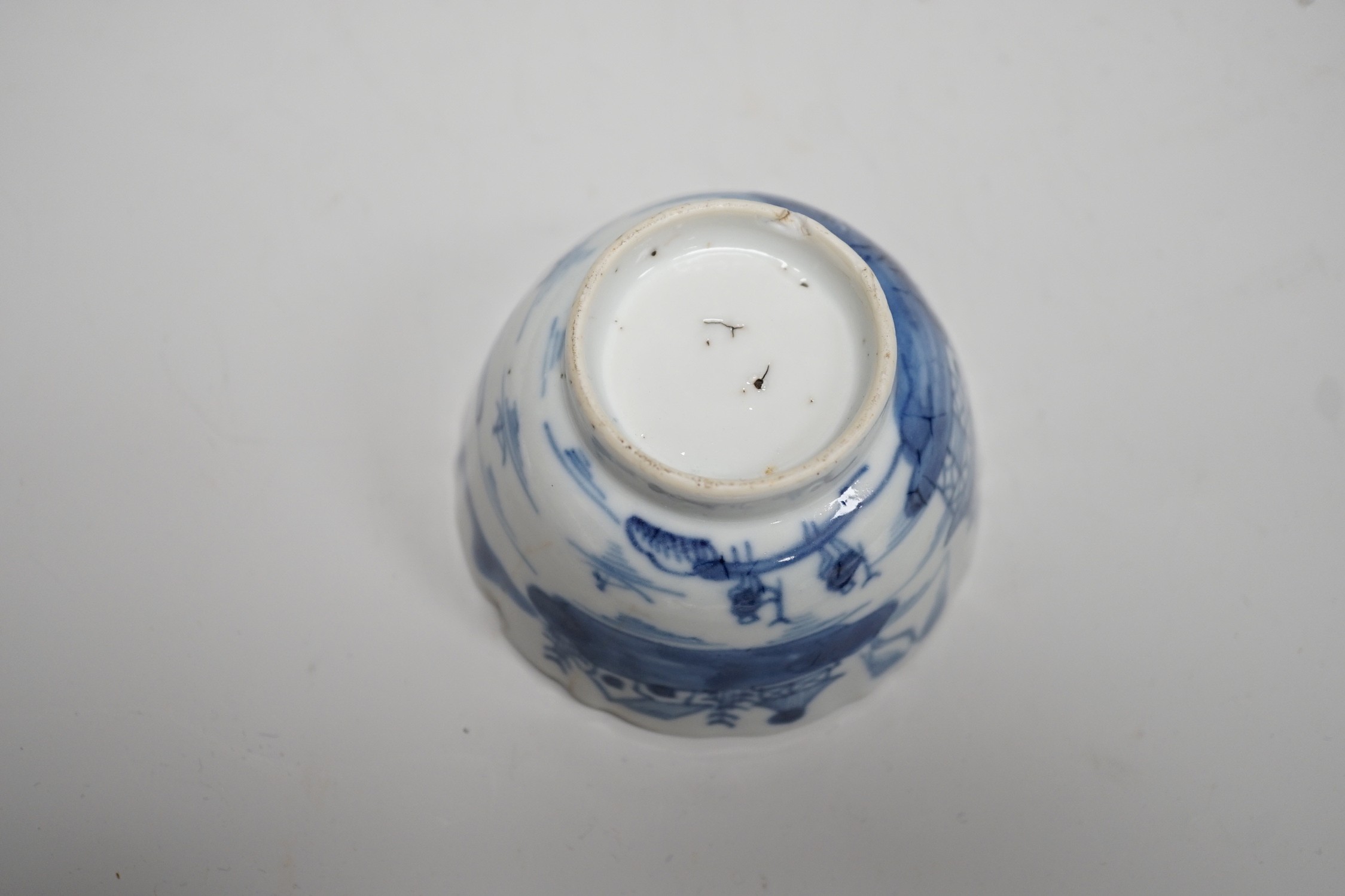 A Chinese sang de boeuf glazed bottle neck vase, together with a Chinese blue and white tea bowl, and a Chinese dish, tallest 23cm